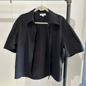 COS short-sleeved button up shirt. Without tags but never been worn.